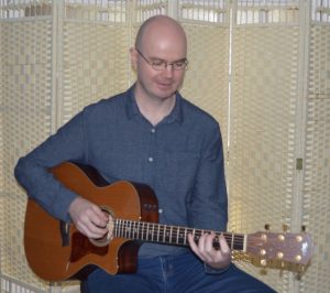 Guitar Teacher Reading